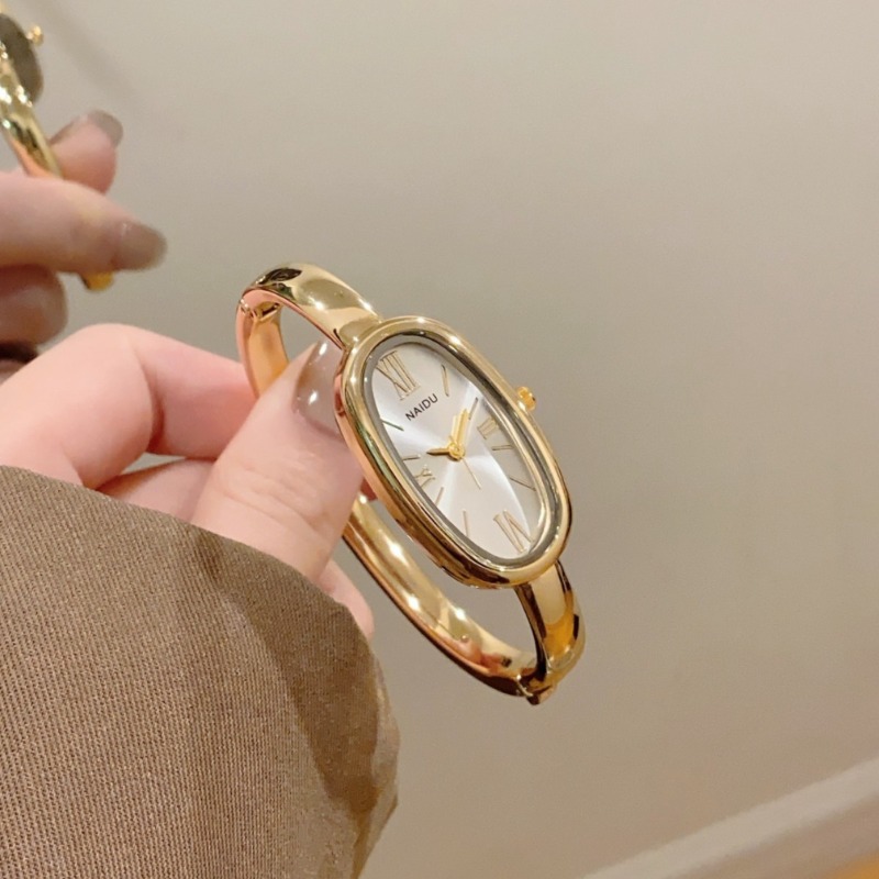 Luxury Watch Girl - ハイエンドの女性用ローマスケールクォーツ時計シンプルなゴールドブレスレットレディースウォッチオーバルダイヤル腕時計時計ドレスモントレファム